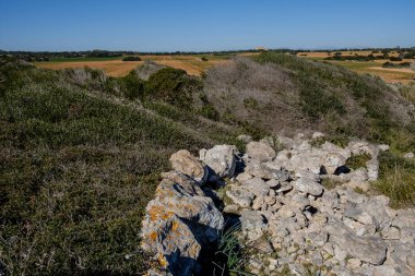 Punta des Baus 'un kalıntıları Talayotik yerleşim, Santanyi, Mallorca, Balear Adaları, İspanya