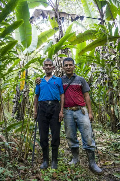 stock image Don Romulo and his father with machetes, Los Cerritos, Lancetillo, La Parroquia, Reyna area, Quiche, Guatemala, Central America