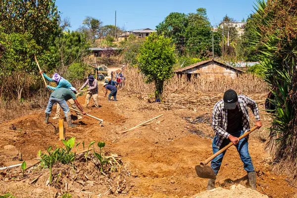 stock image community construction of drinking water pipes, Xullmal, Guatemala, Central America