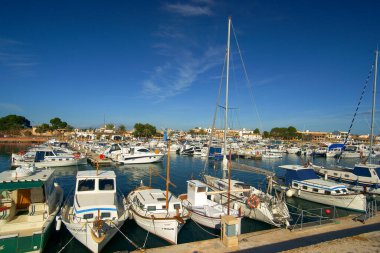 ponts with recreational boats, Estanyol marina, Llucmajor, Mallorca, Balearic Islands, Spain clipart