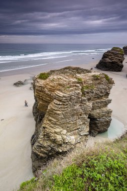 Las Catedrales beach, low tide between the reefs, Ribadeo, Lugo, Galicia, Spain clipart