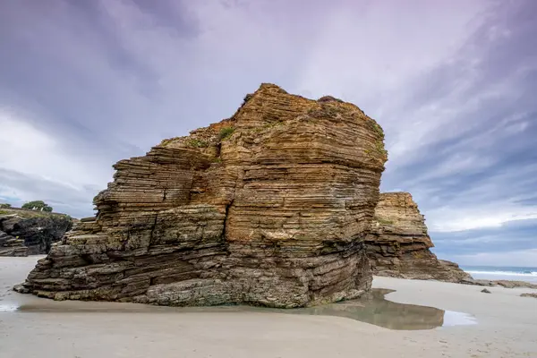 stock image Las Catedrales beach, low tide between the reefs, Ribadeo, Lugo, Galicia, Spain