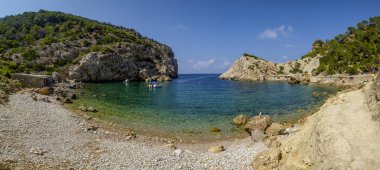 Es Portitxol plajı, taş koy, Sant Joan de Labritja Belediyesi, İbiza, Balear Adaları, İspanya
