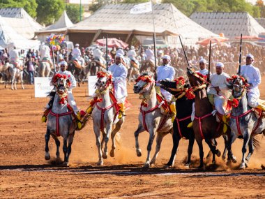 galloping horses, traditional festival, -Fantasia, - Tbourida -, Fez,  Morocco, Africa clipart