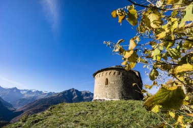 Chapel of Sant Miqueu (chapel of San Miguel), dated to the 10th century , early Romanesque, Vilamos, Aran valley, Catalonia, Pyrenees mountain range, Spain clipart