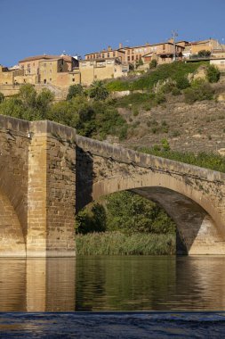 Medieval bridge over the river Ebro, San Vicente de la Sonsierra, La Rioja, Spain clipart