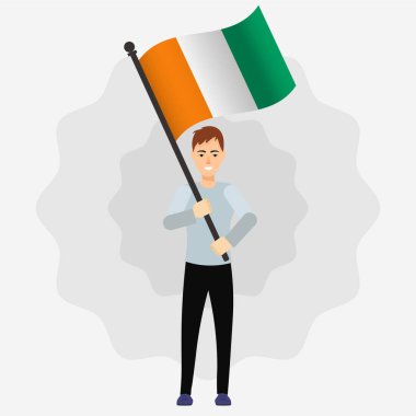 Mutlu Adam Fildişi Sahil Bayrağını Tutuyor