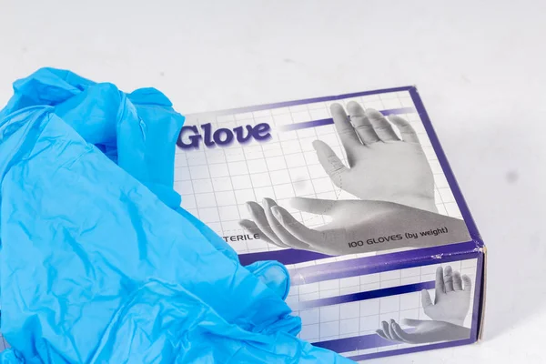 Blue gloves for health protection isolated on white background. Medical nitrile gloves. Manufacture of rubber gloves, latex gloves. protective gloves