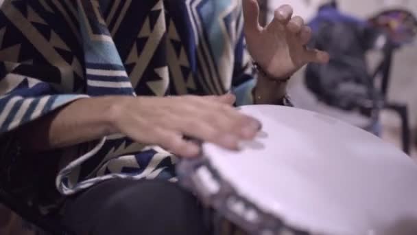 Young Male Playing Djembe Drums Mexican Jam Session Wearing Poncho — Vídeo de Stock