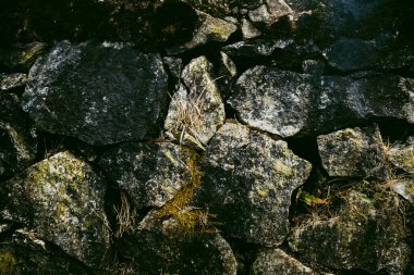 Antik yıpranmış taş duvar arkaplanı.