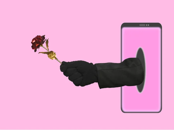 A picture of suspicious hand giving rose flower gold from illustration smartphone on pink background. Valentines concept and love scam concept.
