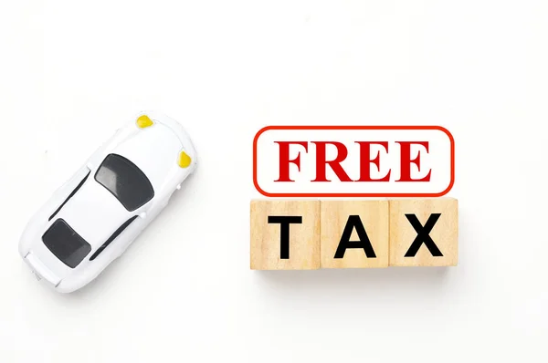 Flatlay picture diorama car with free tax word. Free tax car purchase