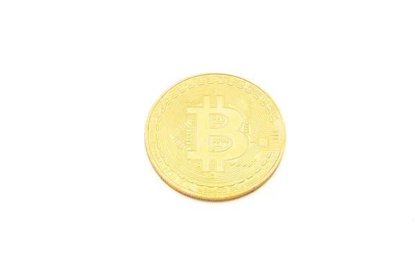 stock image Close-up of a bitcoin golden coin on a white background. Top view. Virtual cryptocurrency and future money concept.