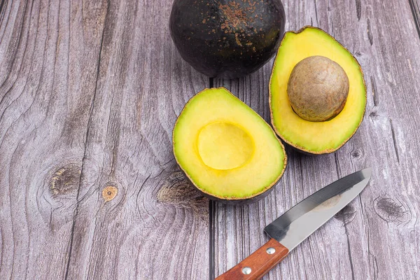 Fresh Avocado Half Knife Placed Wooden Table Organic Fruit Space — Stock Photo, Image