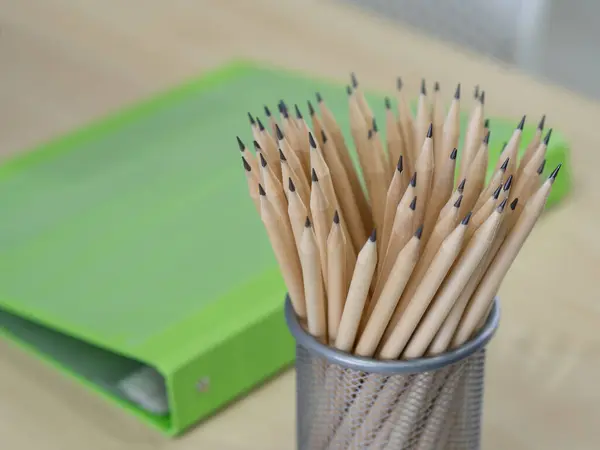Many Pencils Mesh Box Wooden Table Space Text Close Photo — Stock Photo, Image