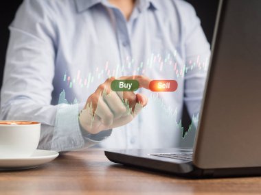 Tüccar bir düğmeye basıp sanal ekranda borsada hisse senedi satar. Borsa ve ticaret kavramı