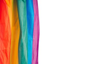Gökkuşağı bayrağının ya da LGBT 'nin üst görüntüsü, kopyalama alanı olan beyaz bir arkaplan üzerindedir. Düz yatıyordu