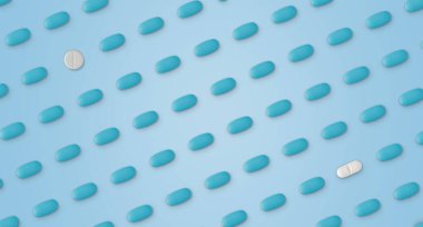 Mavi arka planda hapların kalıbı. Mavi arka planda bir sürü hap.