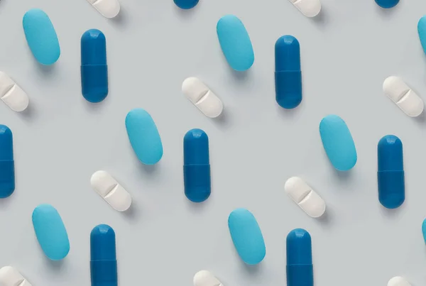 Tabletták Mintázata Kék Háttérrel Sok Pirula Könnyű Háttérrel — Stock Fotó