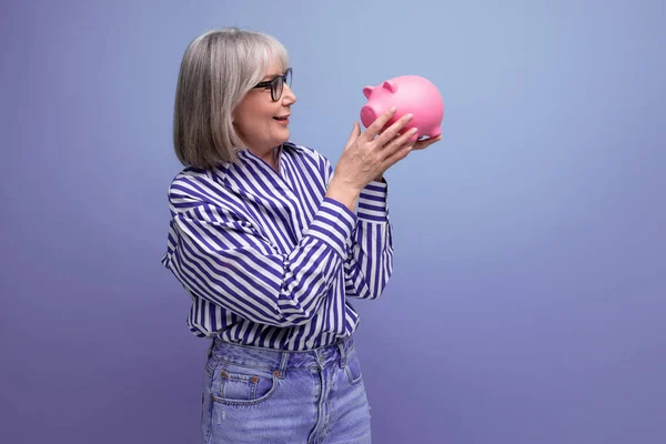 Social Protection 60S Middle Aged Woman Gray Hair Holding Piggy Royalty Free Stock Images