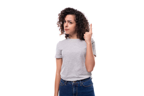 well-groomed caucasian young brunette woman curly hair styling method.