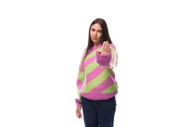 portrait of a well-groomed 35 year old feminine model woman dressed in a pink stylish pullover pointing her hand forward at the camera. clipart