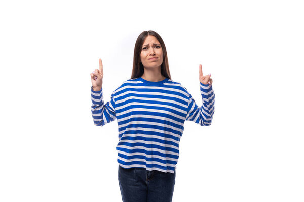 charming young slim european model woman wears striped blouse on white background with copy space.