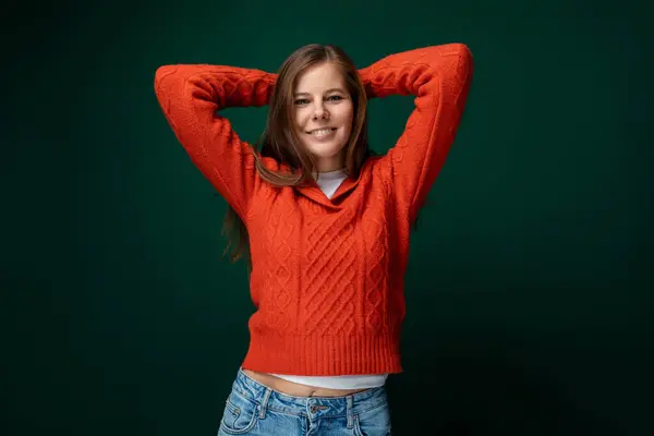 Beautiful Slim Woman Brown Hair Dressed Red Sweater Jeans Green Stock Image