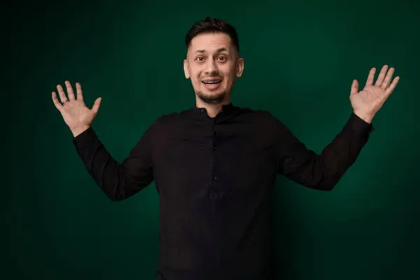 Man Wearing Casual Attire Standing Front Vibrant Green Background Appears — Stock Photo, Image