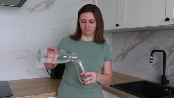 Woman Home Engrossed Healthy Practice Pouring Clear Fresh Water Transparent — Stock Video