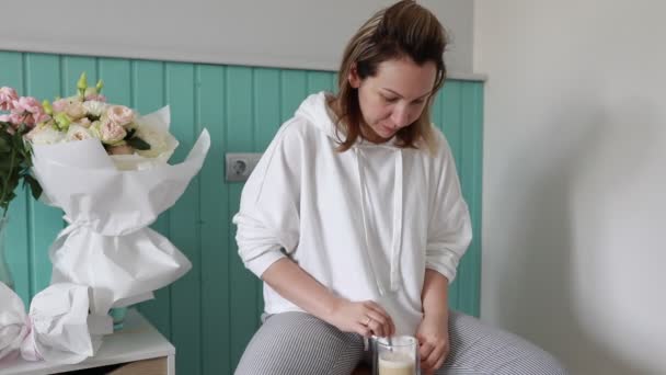 Early Morning Atmosphere Envelops Woman She Sits Comfortably Cozy Kitchen — Stock Video