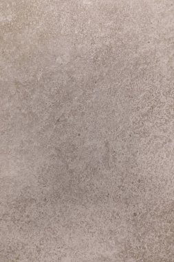 Ayrıntılı bir gri yüzey tasarım uygulamalarında kullanılmak üzere çeşitli doku ve desenleri gösterir. İnce varyasyonlar derinlik ekler, genel estetik cazibeyi arttırır.