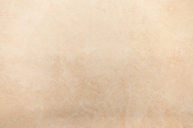 Bu nötr yüzey, çeşitli tasarım projeleri veya arka planlar için ideal yumuşak bej bir dokuya sahiptir. İnce varyasyonlar genel görünümüne derinlik ve karakter ekler.