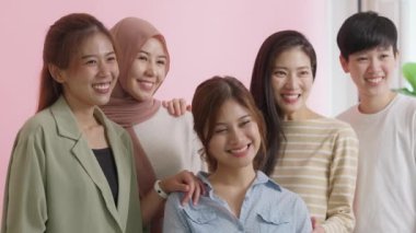 Group of young people Gen Z talent workforce relax smile look at camera standing studio shot shooting. Power of diverse asia girl woman, youth LGBT pride gay lesbian, female lady unity in women's day.