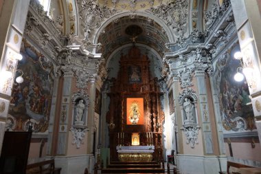 Biar, Alicante, Spain, January 14, 2023: General view of the Churrigueresque style Communion Chapel inside the church of Our Lady of the Assumption of Biar, Alicante, Spain