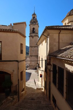 Biar, Alicante, Spain, January 14, 2023: Bell tower of the church of Our Lady of the Assumption of Biar, Alicante, Spain