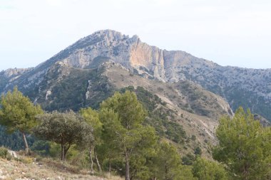 Maigmo mountain range, Tibi, Alicante, Spain, February 17, 2023: Top of Maigmo from the Pere Paia Antennas in the Maigmo mountain range. Alicante, Spain