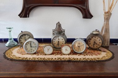 Rojales, Alicante, Spain, October 28, 2024: Antique clocks inside the Orchard Museum in Rojales, Alicante, Spain clipart