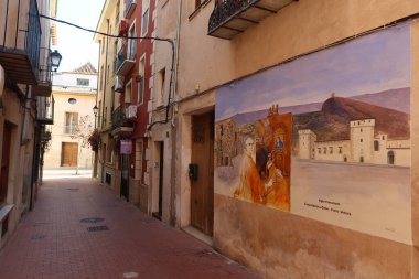 Cocentaina, Alicante, Spain, December 2, 2024: Mural in one of the narrow streets of the old town of Cocentaina, Alicante, Spain clipart