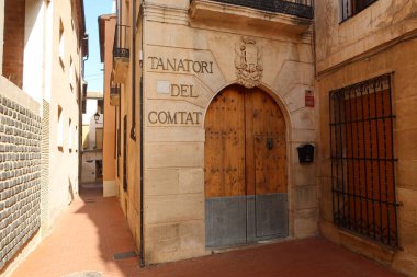 Cocentaina, Alicante, Spain, December 2, 2024: Gate of the county funeral home in the old town of Cocentaina, Alicante, Spain clipart