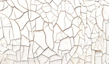 Duvardaki eski çatlak boyanın dokusu. Tasarım için arkaplan.