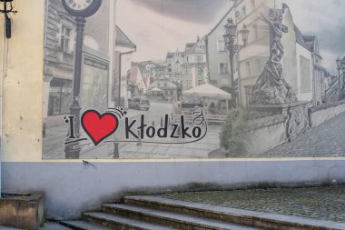 The city architecture of Klodzko, Poland, featuring a blend of medieval buildings, charming streets, and vibrant facades that reflect its rich history. clipart