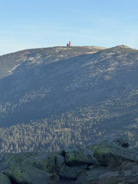 From Szrenica peak in the Karkonosze, sweeping views of valleys and mountains unfold across the stunning landscape clipart