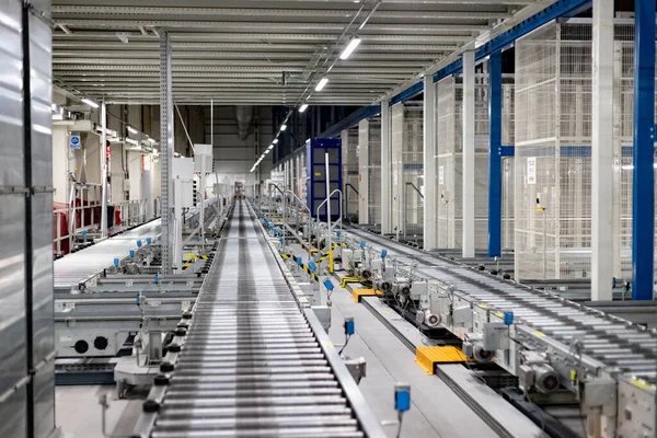 stock image Factory. Factory in food chain. Production line. Autonomous robots moving the boxes from the shelves. Horizontal Photography.