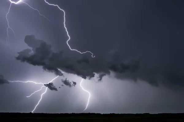 stock image Ray. Lightning storm. Lightning bolt storm. Fork lightning striking. Lightning thunderstorm flash over the night sky. Concept on topic weather, cataclysms (hurricane, Typhoon, tornado, storm).