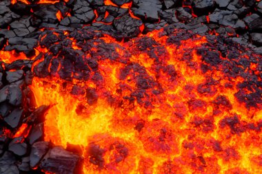 Volcano Stromboli. Etna. Sicily. Italy. They overturn with magma on the walls of the volcanic cone. Hot wash. New eruption. 2024. Hot rocks. 5 July