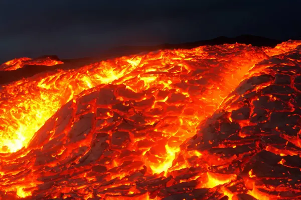 Volcano Stromboli. Etna. Sicily. Italy. They overturn with magma on the walls of the volcanic cone. Hot wash. New eruption. 2024. Hot rocks. 5 July