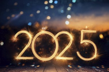 2025 yılı. Mutlu yıllar 2025. Parlak bir yeni yıl. 2025 balon. 2024 'ten 2025' e kadar tahta blok. Yeni bir yıla giriyoruz. Arkaplan tasarımı ve tebrikler. Havai fişeklerle tasarlandı. Boşluk.