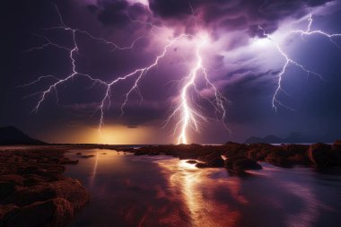 Lightning. Lightning strike. Spectacular night view of a lightning bolt streaking across the dark blue sky. Lightning and thunder and flashes. Clouds and silhouettes of trees are visible. Ireland. Eowyn.