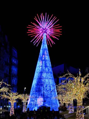 Christmas. Lights. Christmas lights through the streets of Vigo. Decorating streets of the city. Fir tree with Christmas lights. Christmas ball. On. VIGO. SPAIN. 28 December 2024. clipart